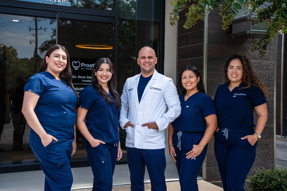 ProsthDent Team, Magnolia, TX Dr. Rene Gonzalez and the ProsthDent dental team standing outside their Magnolia office
